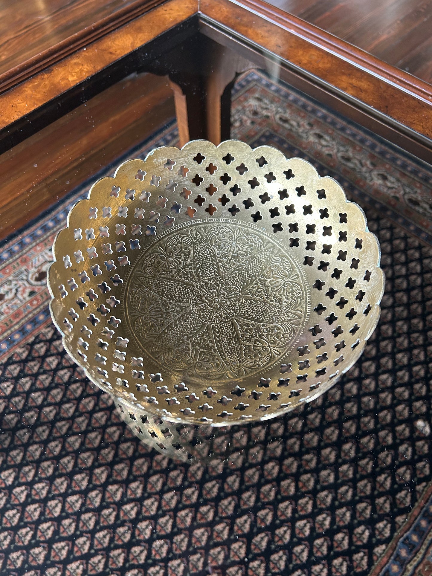 ornate brass bowl with intricate cutouts