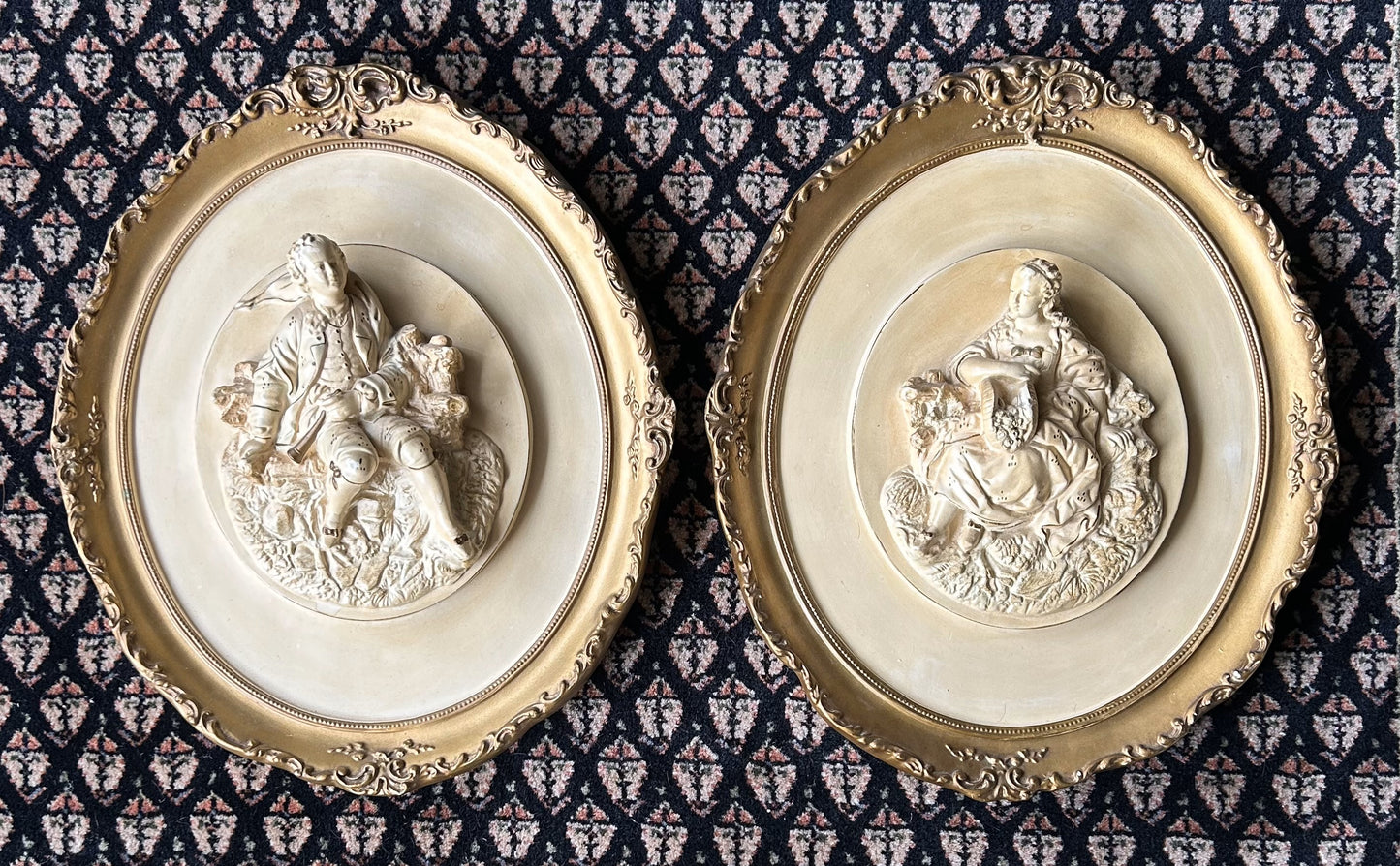 pair of heavy chalkware wall plaques