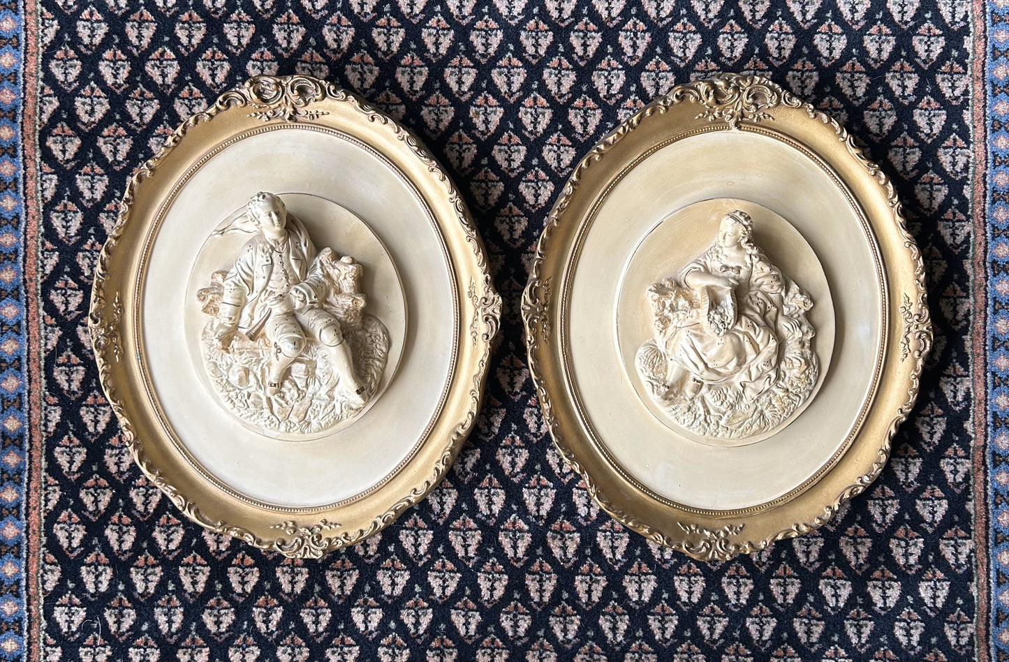 pair of heavy chalkware wall plaques