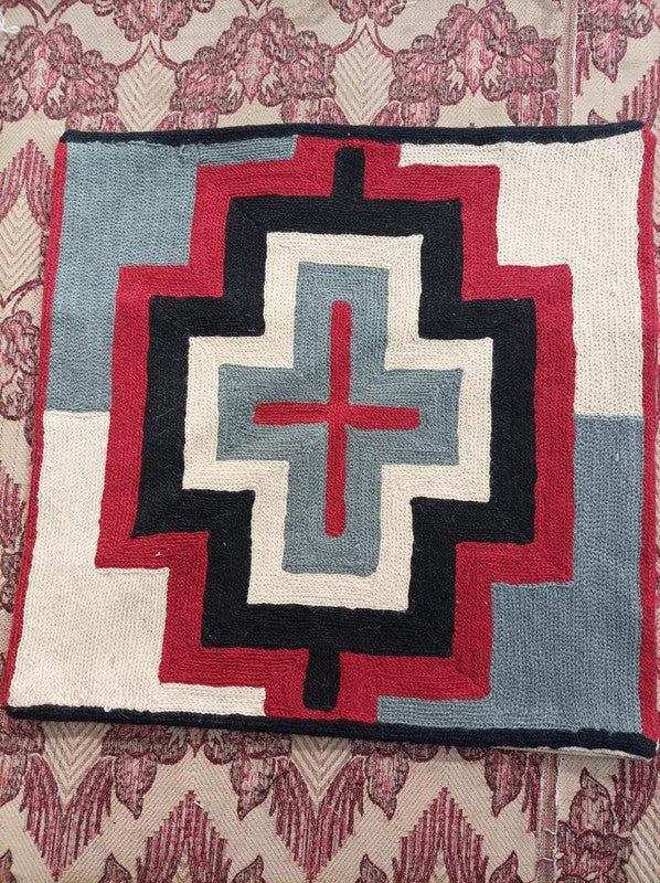 handmade pillow cover from Kashmir, India -- red, steel, and ivory cross