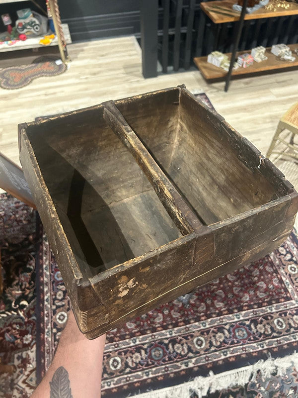 antique, primitive wooden storage with metal accents