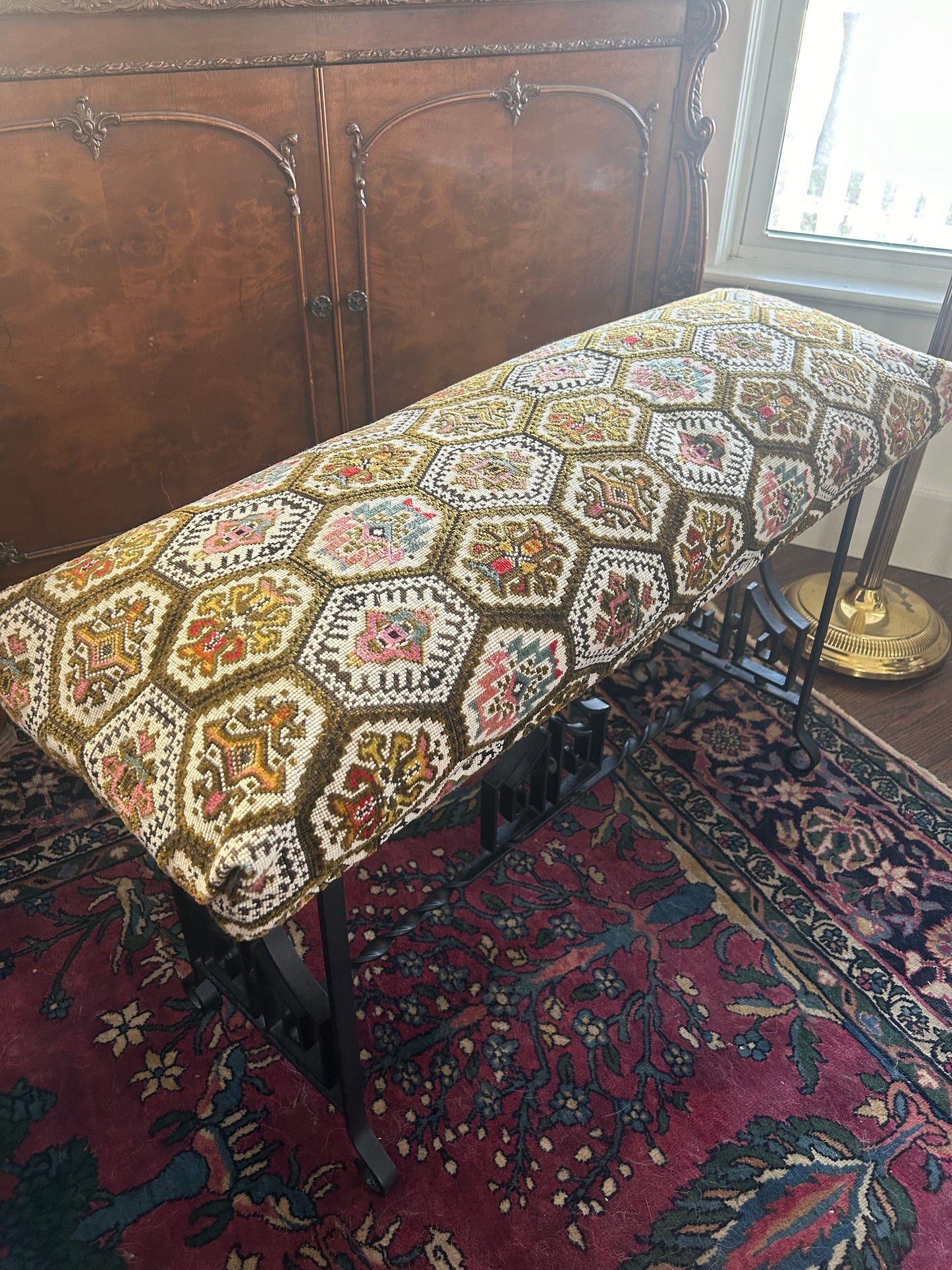 Italian wrought iron bench with needlepoint upholstery