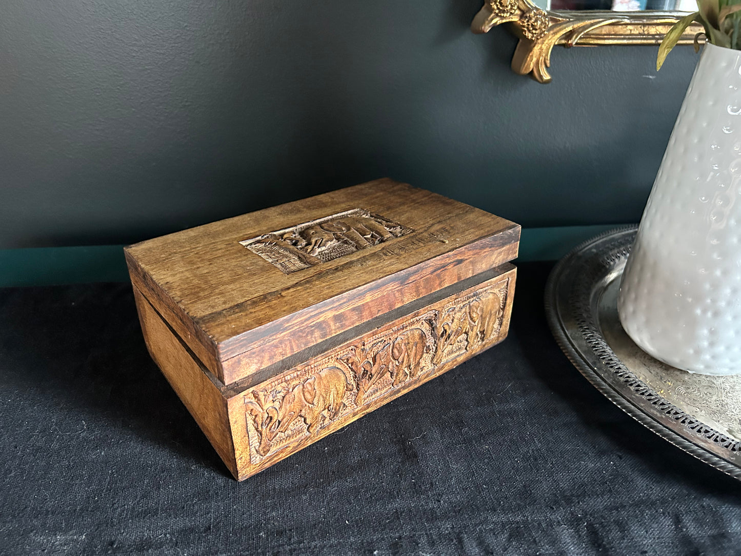 medium-toned hand-carved wooden box