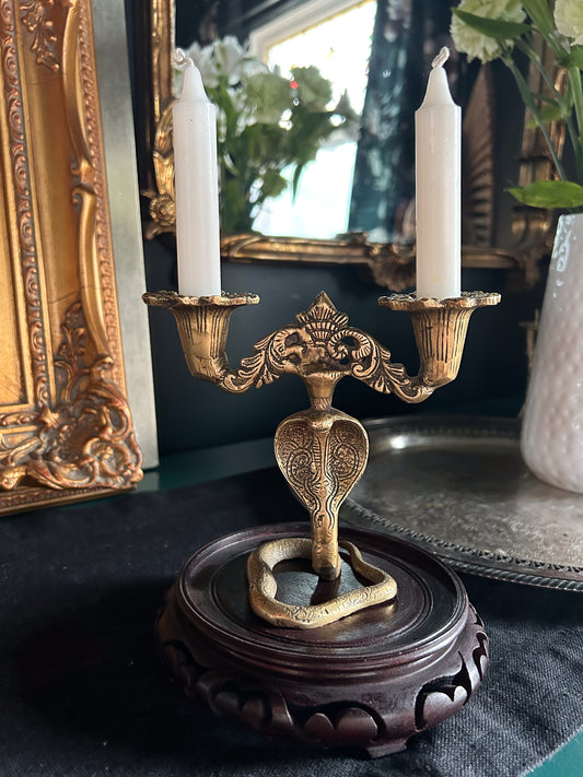 hand-carved brass serpent candle holder