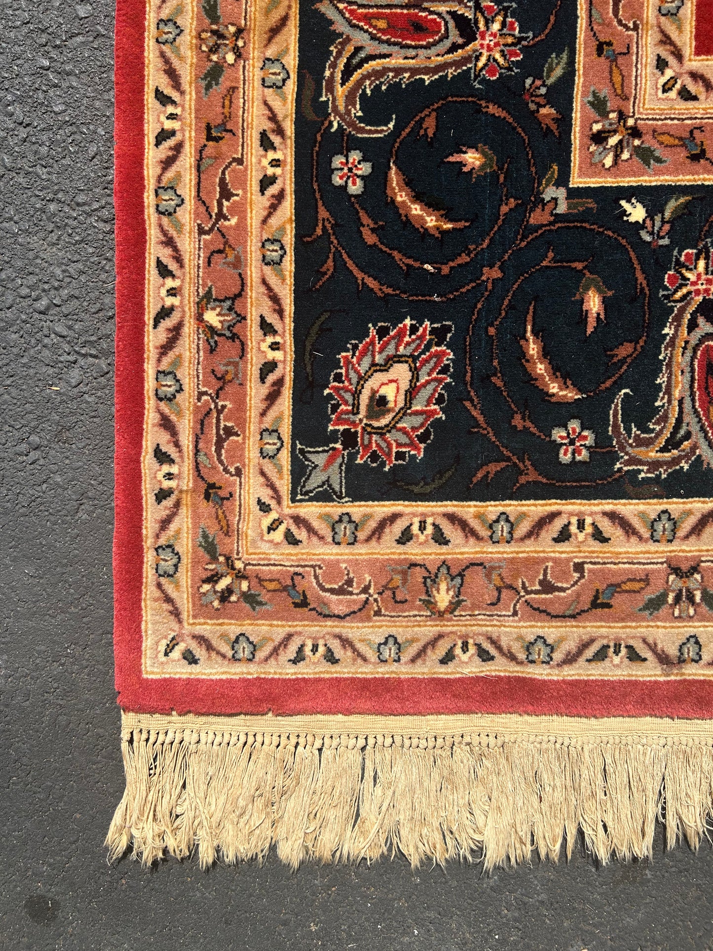 pink and black handwoven Sarouk rug